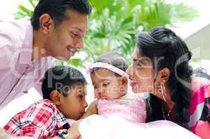 Happy Indian family with two children