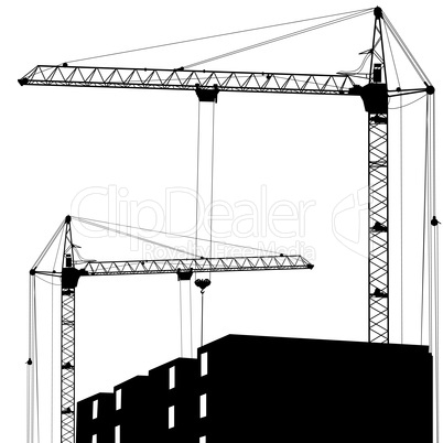 Silhouette of two cranes working on the building