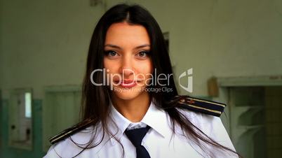 Beautiful girl posing for the camera in clothing cadet.