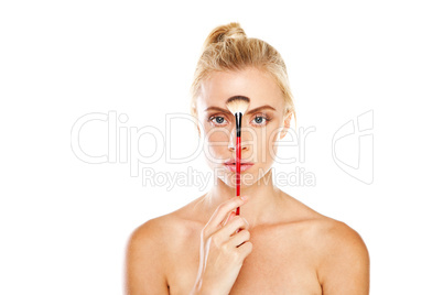 Woman with make-up brush