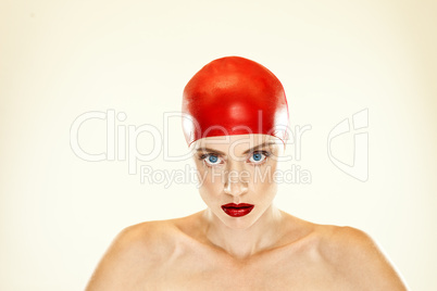 Woman in red swimming cap