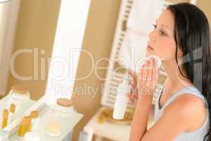 Young woman bathroom clean face make-up removal