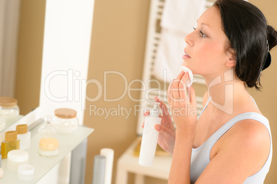 Young woman bathroom clean face make-up removal