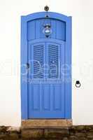 blue colorful front house door in parati brazil