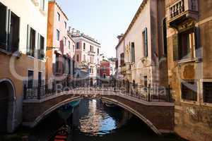bridge of the small canal in the beautiful city of venice in italy