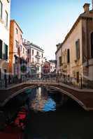 bridge of the small canal in the beautiful city of venice in italy