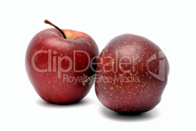 Two red ripe apples