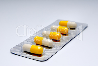 Capsules with a medicine