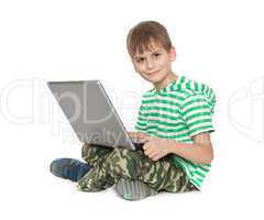 Boy holding a laptop