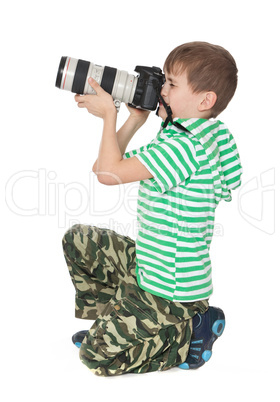 Boy holding a camera