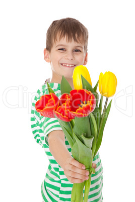 Young boy holding tulips