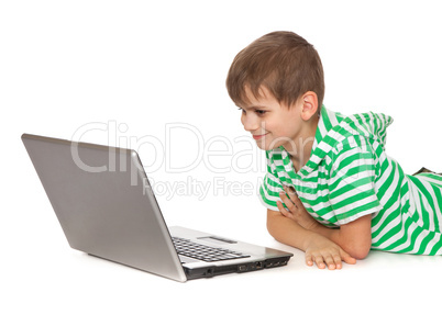 Boy holding a laptop