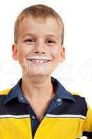 Young boy has moustache of milk on his lips
