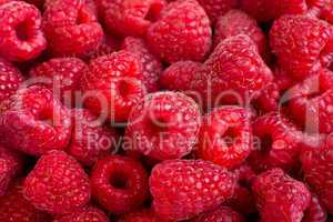 Ripe rasberry fruit horizontal close up background.