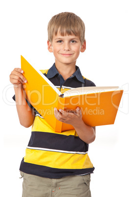 School boy is holding a book