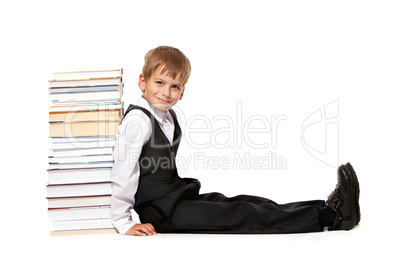 Boy and books. Back to school