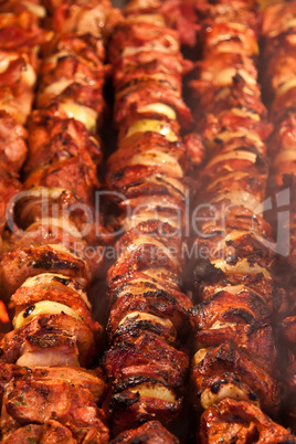 Steak and other meat on barbeque. Background