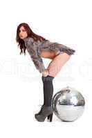 Party dancer on high heels with disco ball