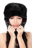 Portrait of a beautiful lady in fur cap