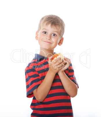 Boy holding an apple