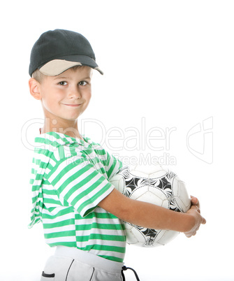 Boy holding soccer ball