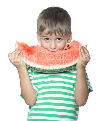 Boy holding a watermelon