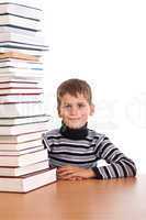 Schoolboy and a heap of books