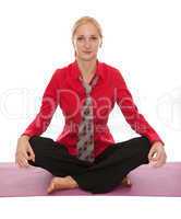 Practicing Yoga. Young businesswoman