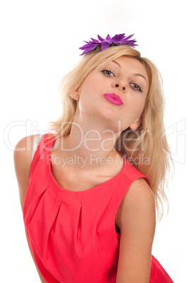 Portrait of young blonde woman kissing