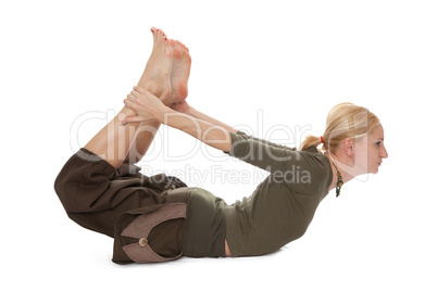 Practicing Yoga. Young woman