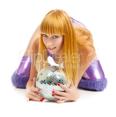 Beautiful young blonde holding a big disco ball