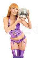 Beautiful young blonde holding a big disco ball