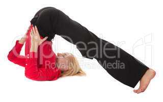 Practicing Yoga. Young businesswoman