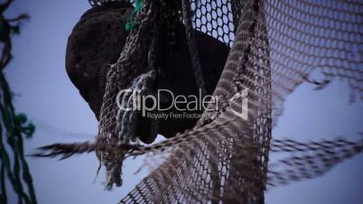 Old fishing nets blowing in the wind. Old and rusted machinery. HD 1080p. Beach in Reykjavik Iceland.