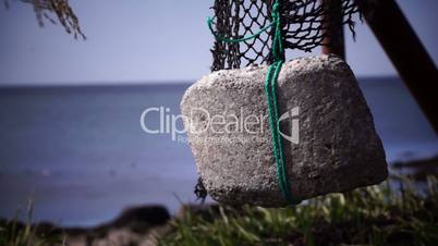 Old fishing nets blowing in the wind. Old and rusted machinery. HD 1080p. Beach in Reykjavik Iceland.