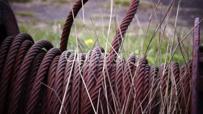 Old fishing nets blowing in the wind. Old and rusted machinery. HD 1080p. Beach in Reykjavik Iceland.