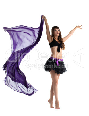 woman in dance costume posing with flying cloth