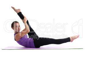 Young woman yoga instructor doing split isolated