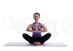 young woman sit in lotos as yoga asana on mat