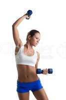 woman posing with dumbbells in fitness costume