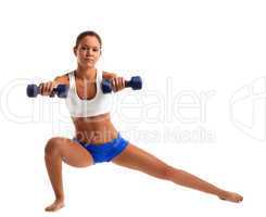 fitness instructor doing split with dumbbells