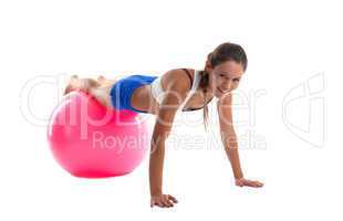 woman training on fitness ball isolated
