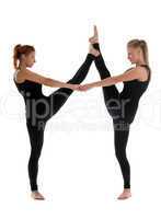 two woman gymnast in black stand on split