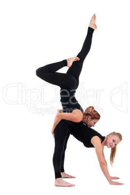two woman gymnast in black show acrobatic exercise