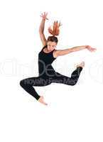 young woman doing perfect jump in black costume