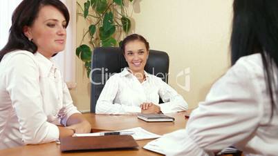 Business Women Working Together in a Meeting