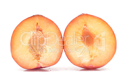 plum on a white background, close-up