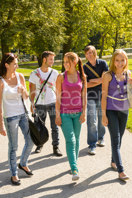 Students walking to school teens happy campus