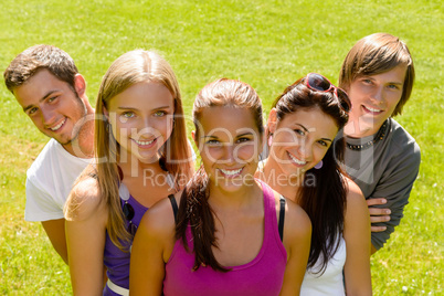 Teens relaxing in the park friends happy