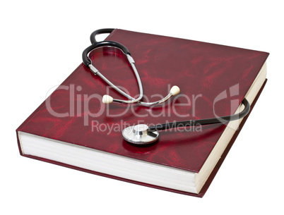 Medical Stethoscope on the red book. Isolate on white background